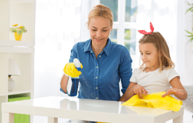woman and daughter cleaning together