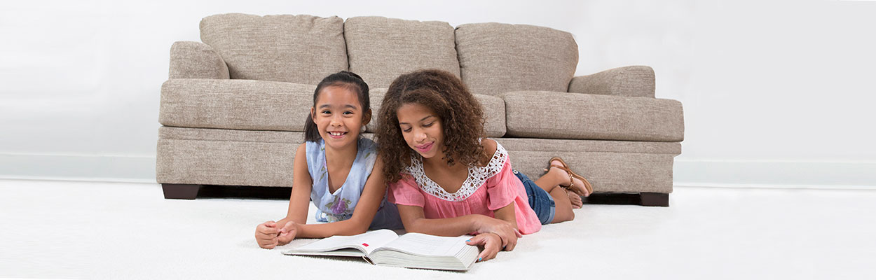 Two girls on carpet