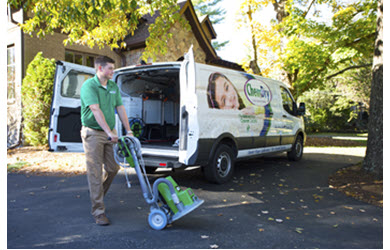 carpet cleaner heading into home