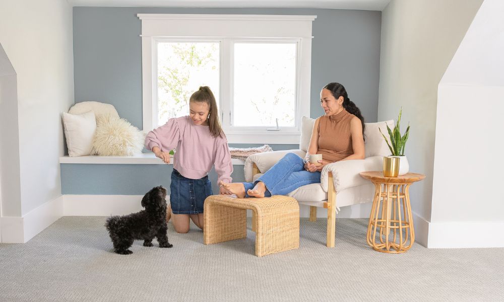 Mom and daughter with dog