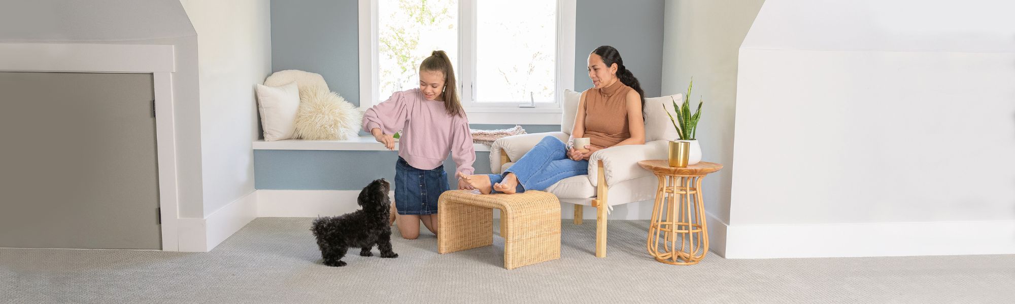 Mom and daughter with dog