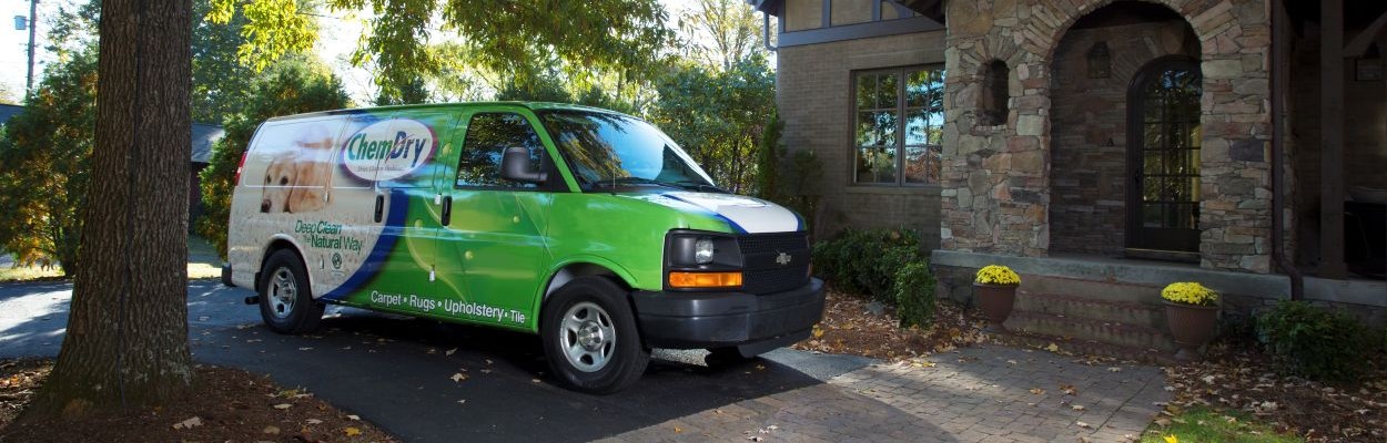 Chem-Dry truck parked in front of a business