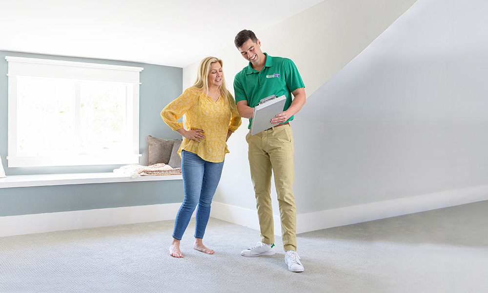 Chem-Dry technician with customer in home