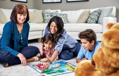 family plays game on a clean carpet