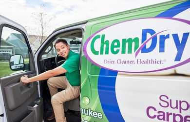 Chem-Dry carpet cleaning service cleaner exits work truck