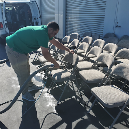 tech cleaning chairs