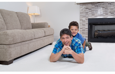 dad and son enjoy carpet cleaning