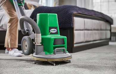 carpet cleaner uses machine for deep carpet cleaning