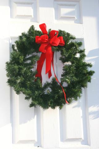 Christmas wreath hanging on door